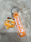 Porte clé good luck orange